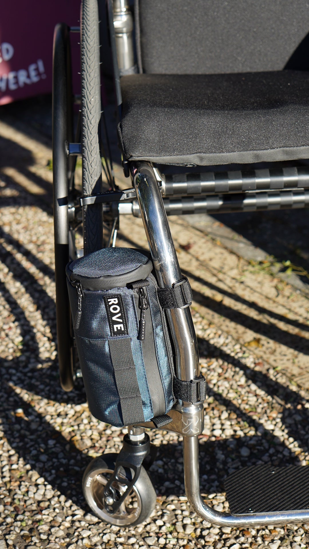 Rove Roll Bag mounted on wheelchair front end